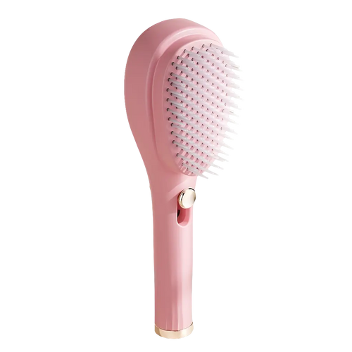 Comb Hair auto cleaning brush in pink.