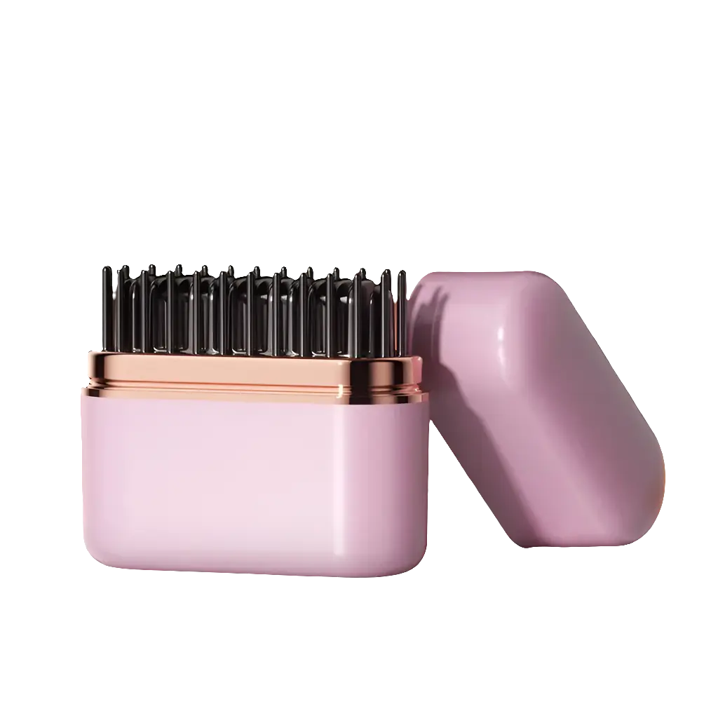 Mini hair straightening brush with pink and rose gold design.