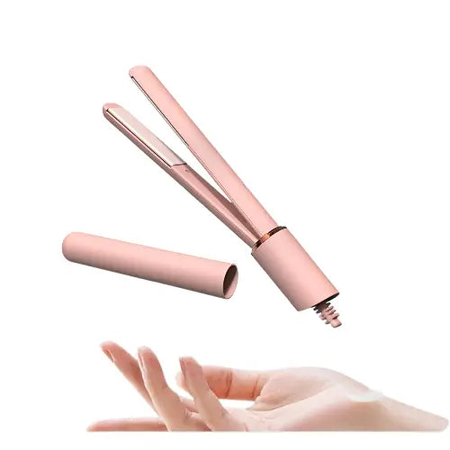 Mini pink hair straightener and curler with quick heat technology.